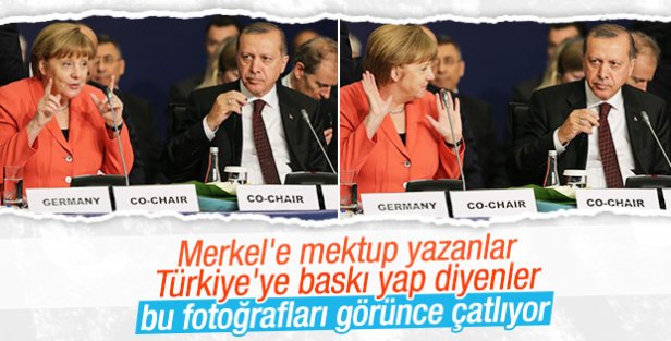 Merkel İstanbul'daki zirvede Erdoğan'la yan yana