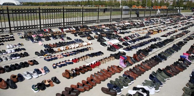 Selde ıslanan ayakkabılar Yenikapı'da kurutuluyor