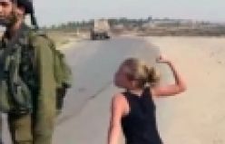  İsrail Askeri Neye Uğradı Şaşırdı      İsrail askerine kafa tutan kızın videosu   internette   izlenme rekoru    kırıyor.